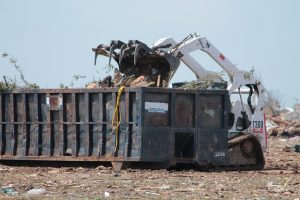 dumpster with trash